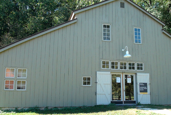 A picture of a wide, beige building