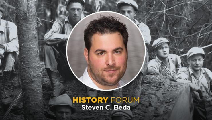 Author photo in front of a historical photo of timber workers